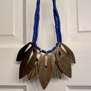 Noonday necklace, color: gold & blue